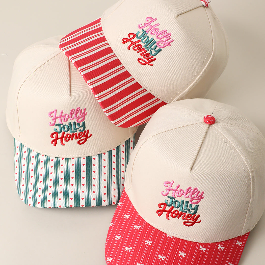 Holly Jolly Honey embroidered holiday brim trucker hats in red and green