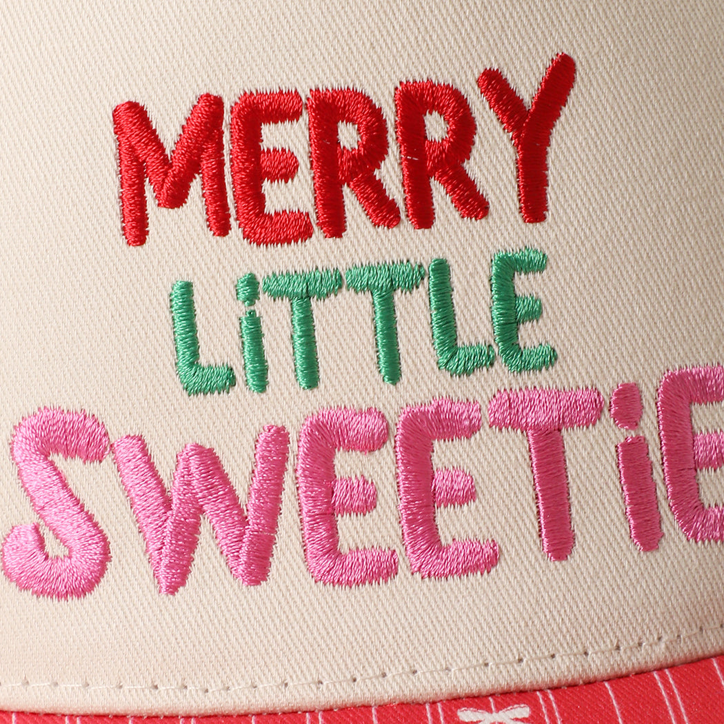 Merry Little Sweetie holiday striped brim trucker hat in red, angled view