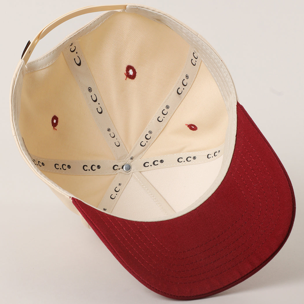 Blondes Have More Fun trucker hat in burgundy, detail view