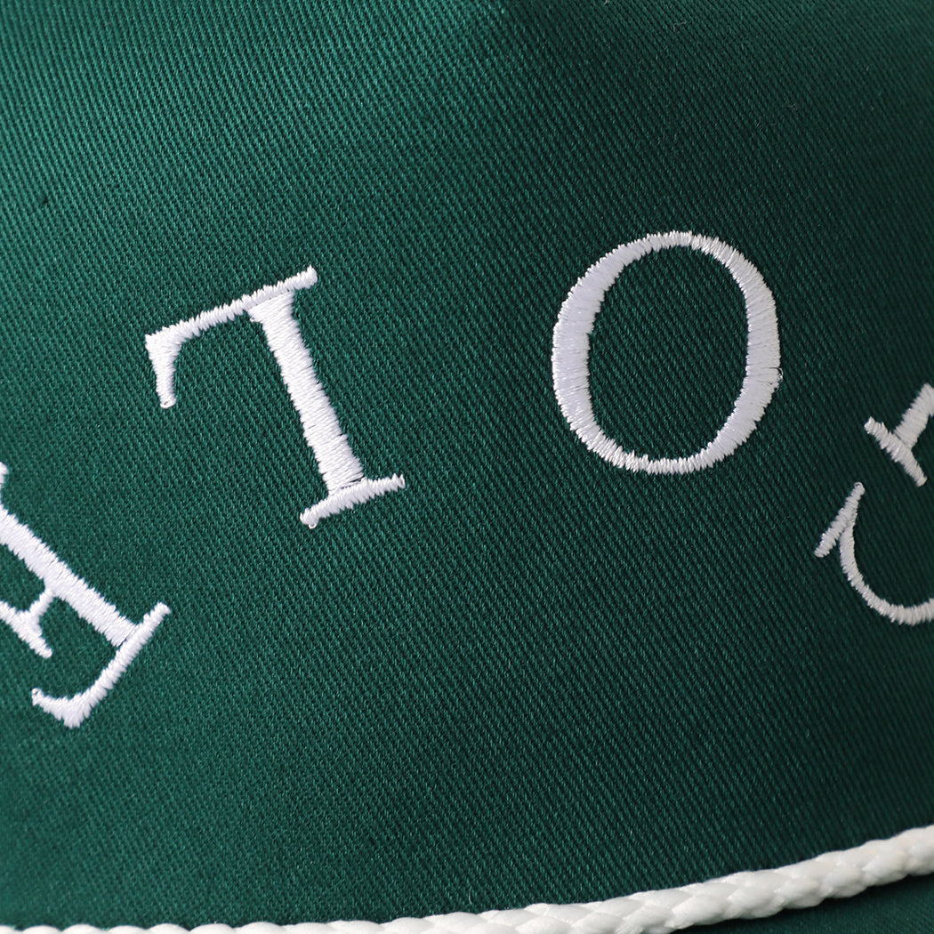 Golf Upside Down rope trucker hat in dark green and white, side view