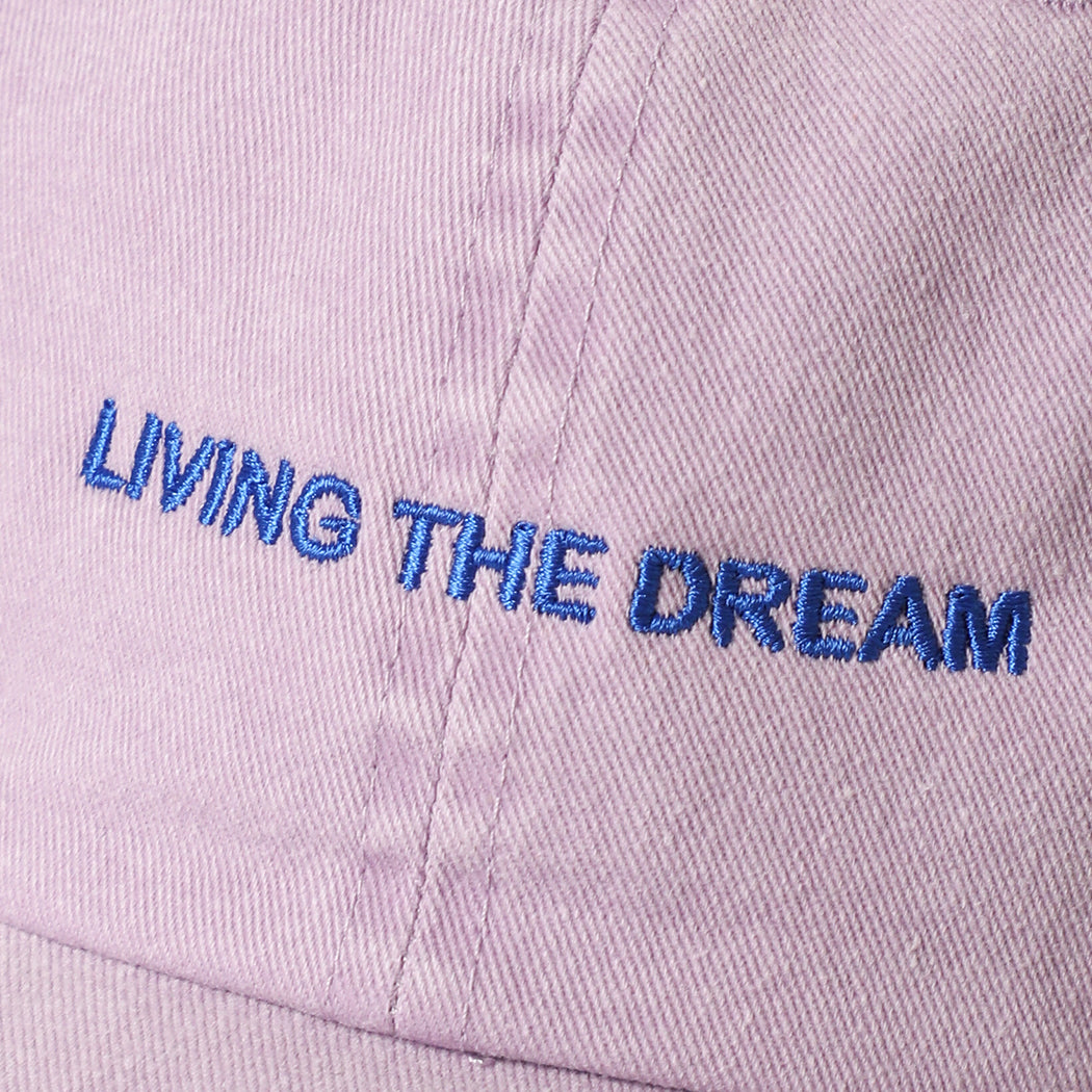 Living the Dream embroidered baseball cap in lilac, side view