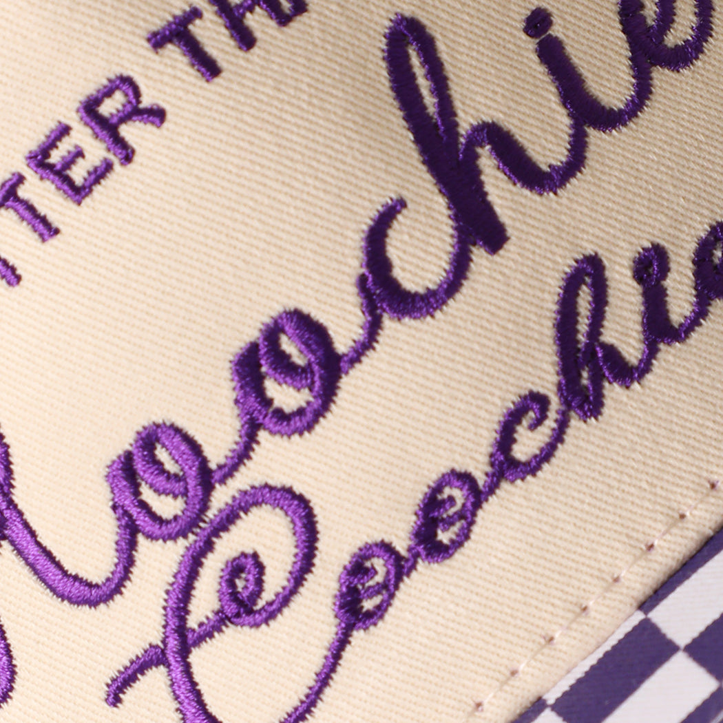 Hotter Than a Hoochie Coochie checkered brim trucker hat in purple, side view