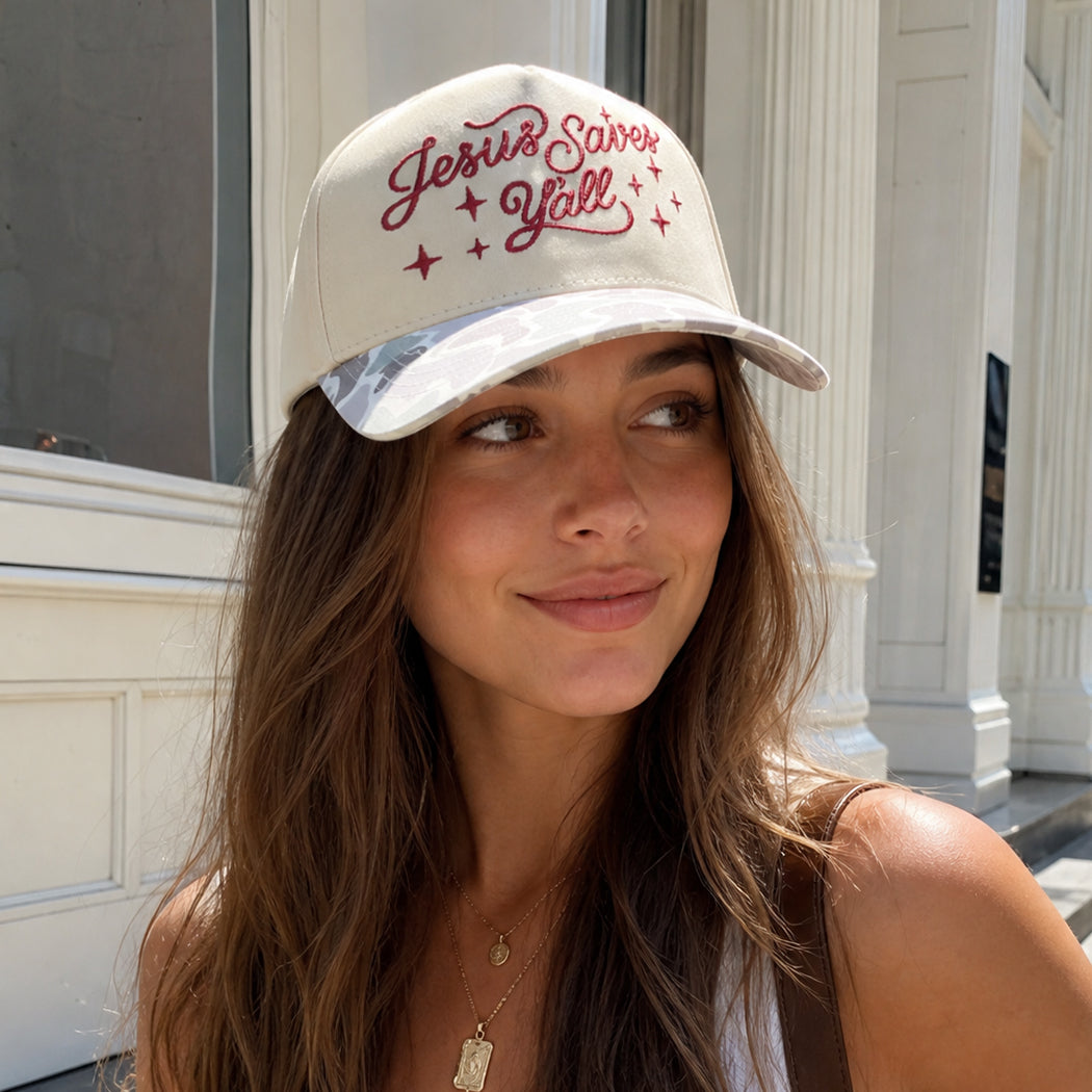 Jesus Saves Y'all embroidered camo brim trucker hat, front view