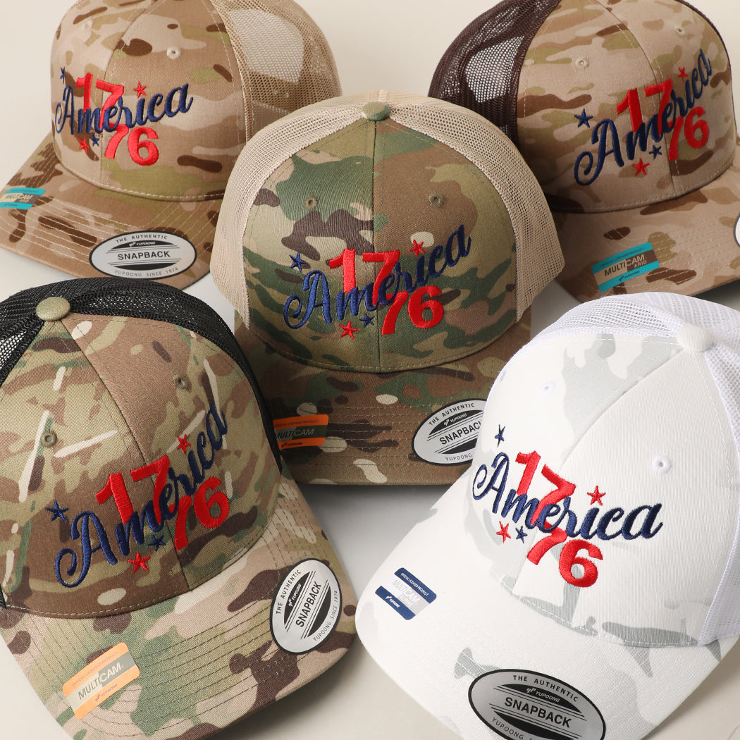 Flexfit YP America 1776 camo trucker hat shown in all color options