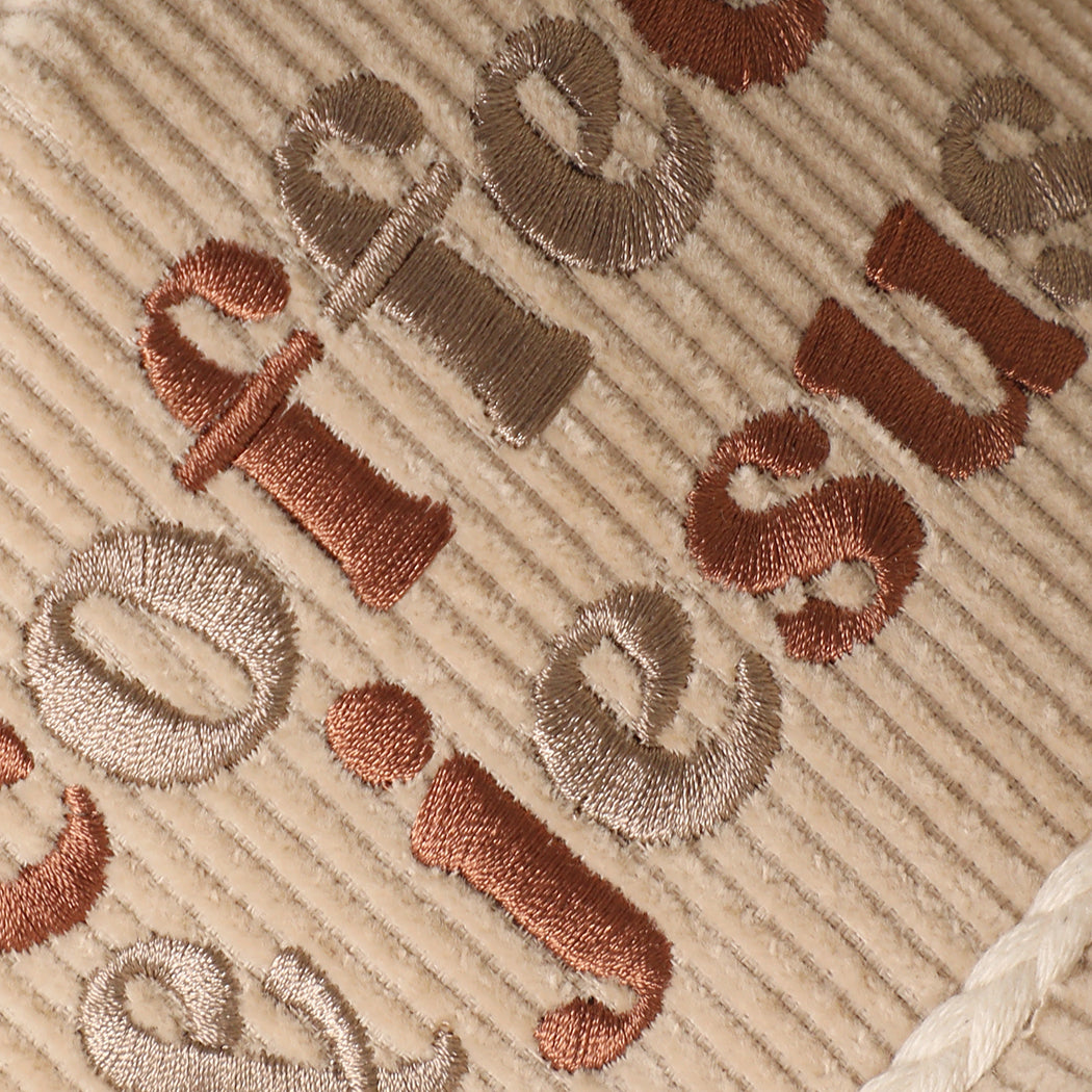 Coffee & Jesus corduroy rope trucker hat in sand, side view