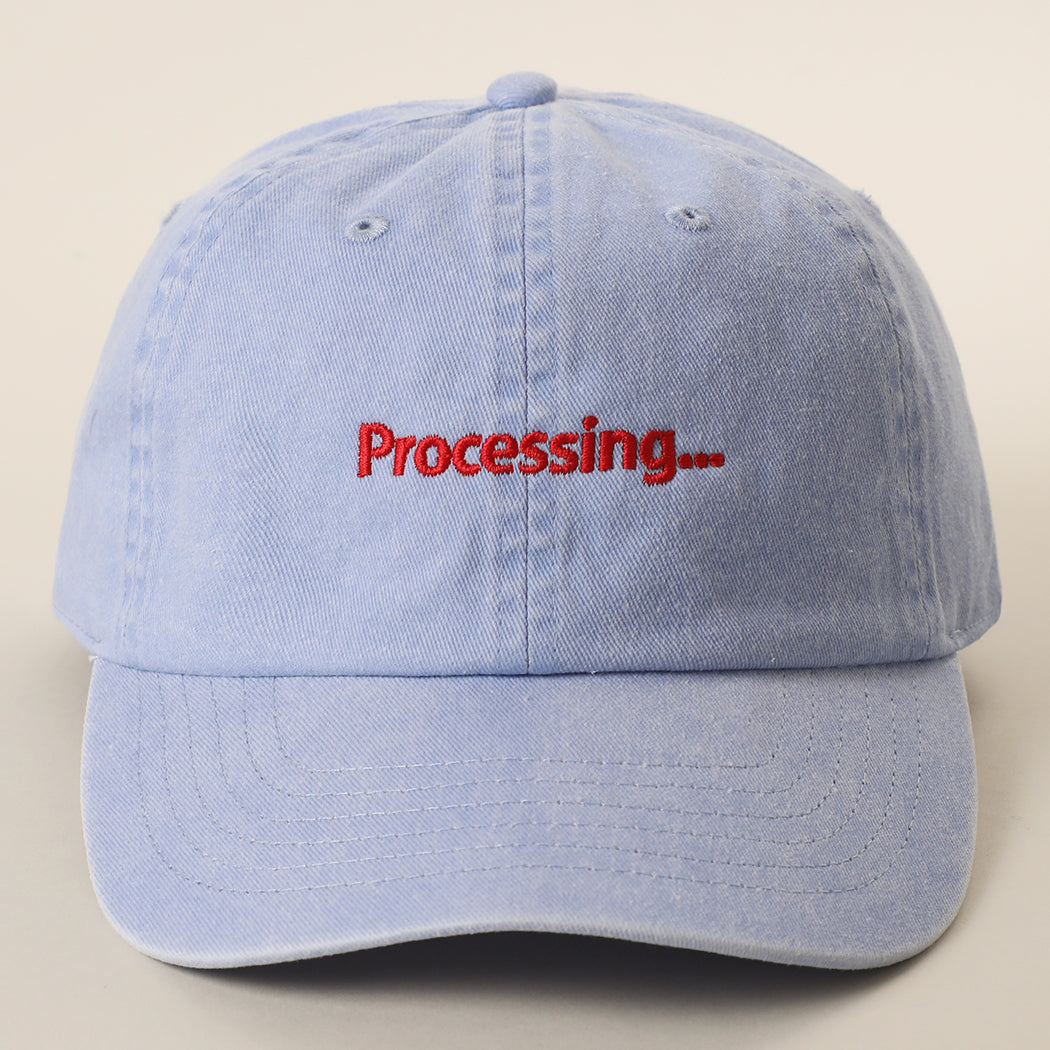 Processing embroidered baseball cap in sax blue