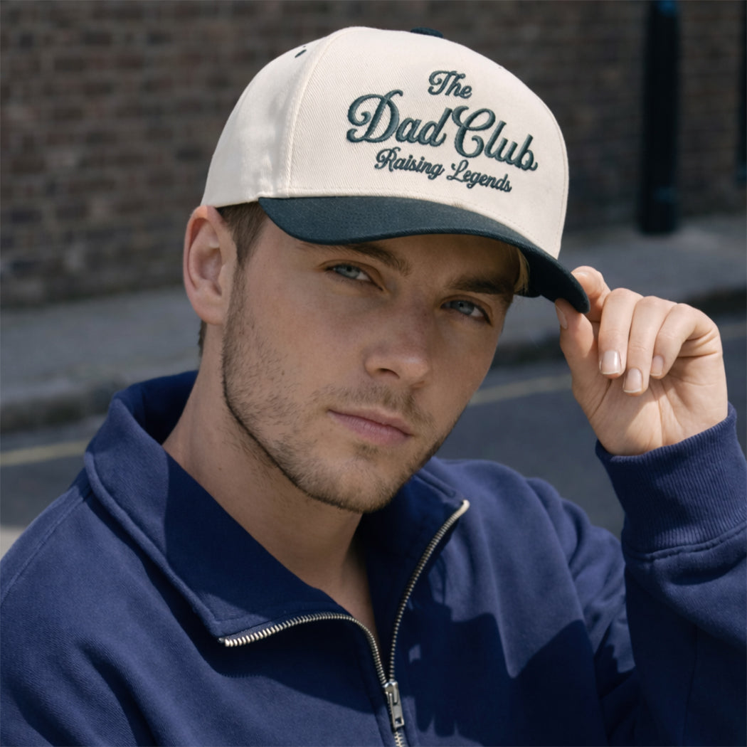 The Dad Club Raising Legends trucker hat, front view alternate angle