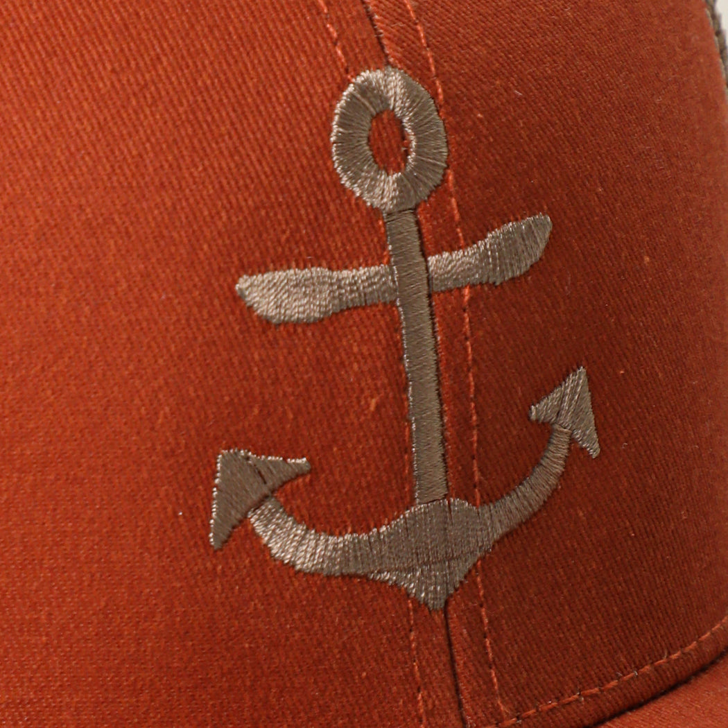 Anchor OTTO two-tone trucker hat in orange and khaki, side view