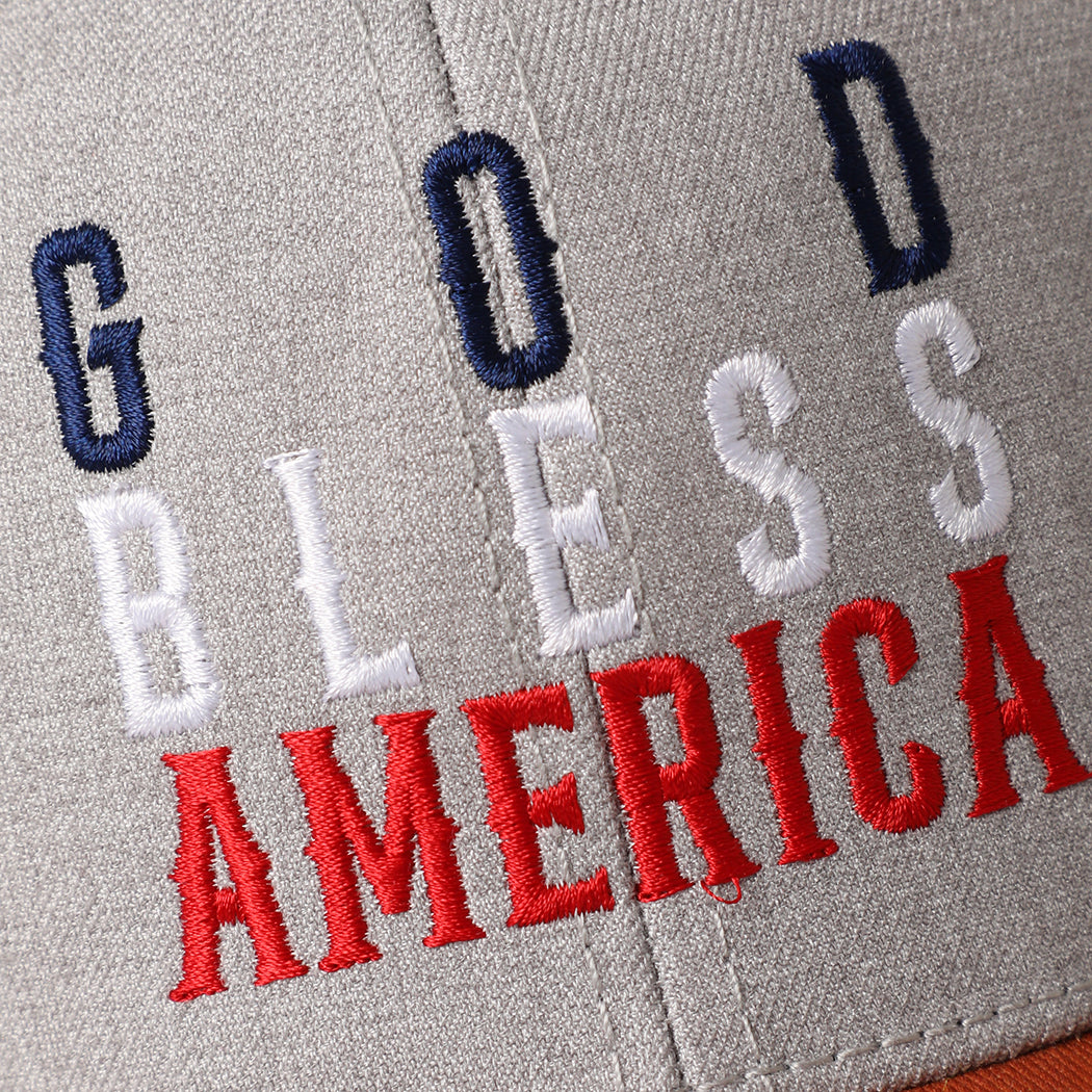 God Bless America mid profile trucker hat in orange and heather grey, side view