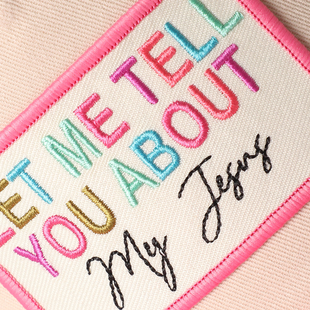 Let Me Tell You About My Jesus patch trucker hat in hot pink, side view