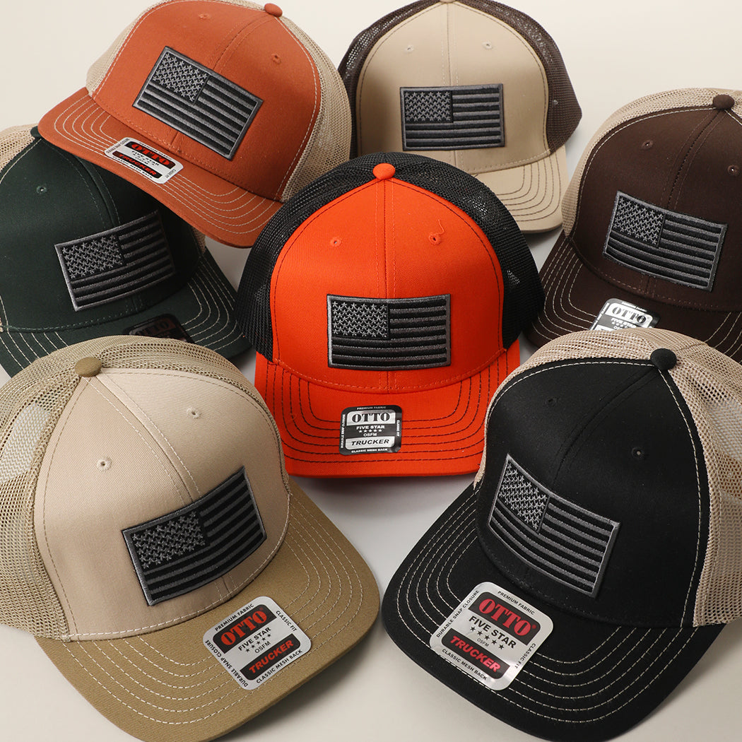 Black American Flag patch mesh-back trucker hat, front view