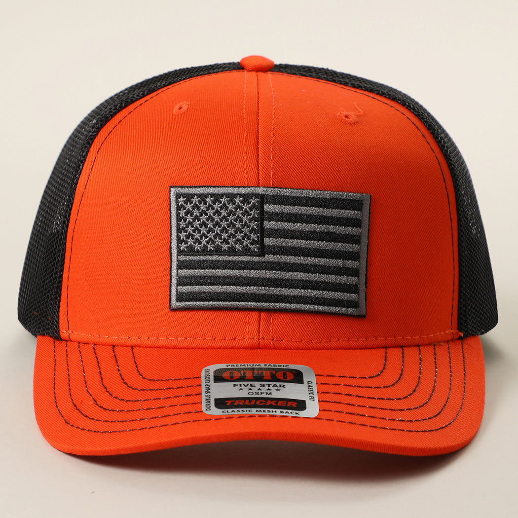 Black American Flag patch trucker hat in orange and black