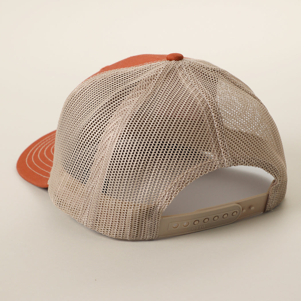 Black American Flag patch trucker hat in orange and khaki, detail view