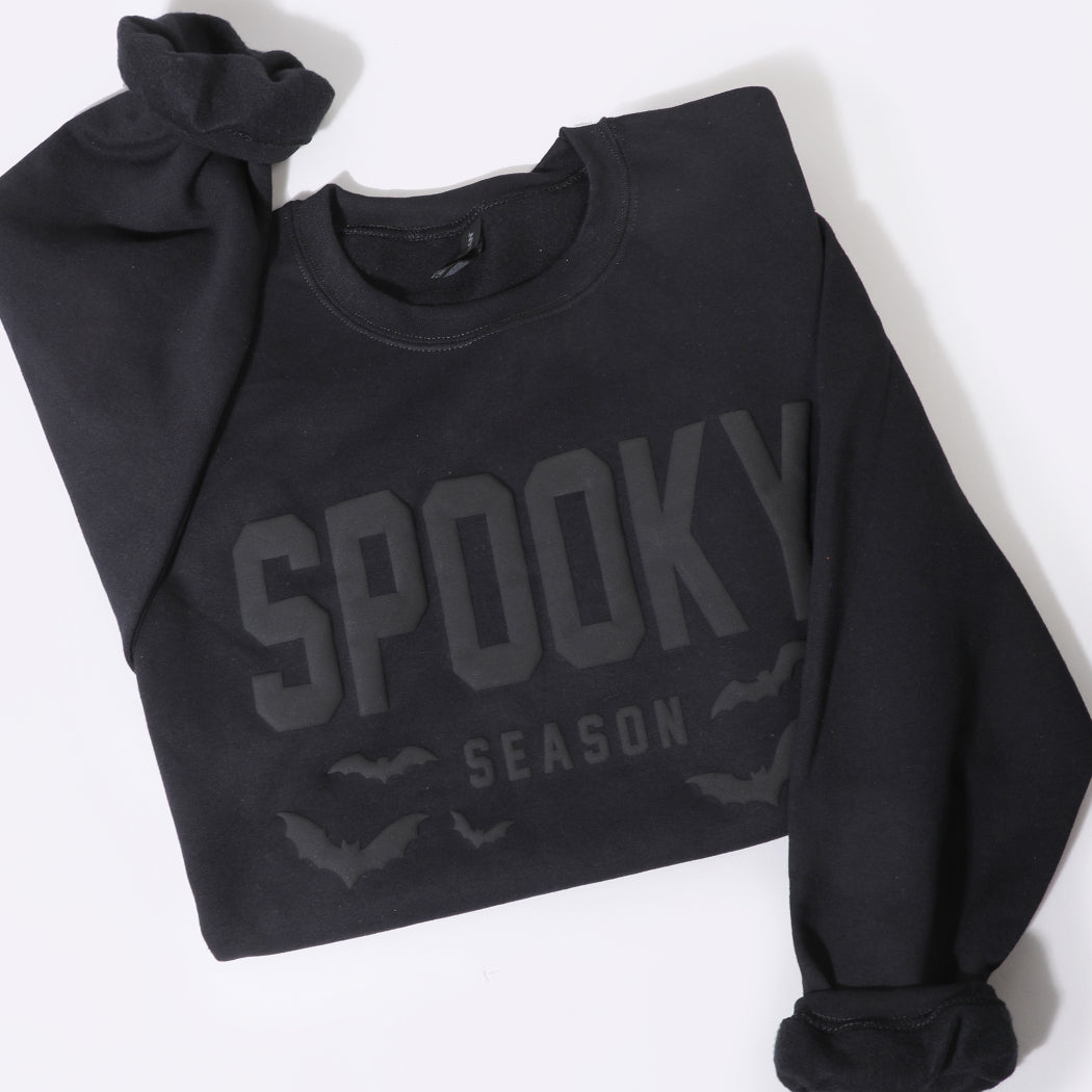 Spooky Season bold puff sweatshirt in black, front view