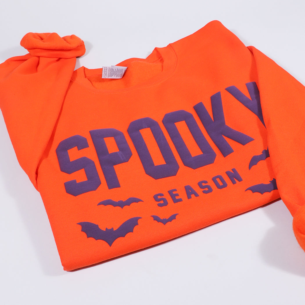 Spooky Season bold puff sweatshirt in orange, back view