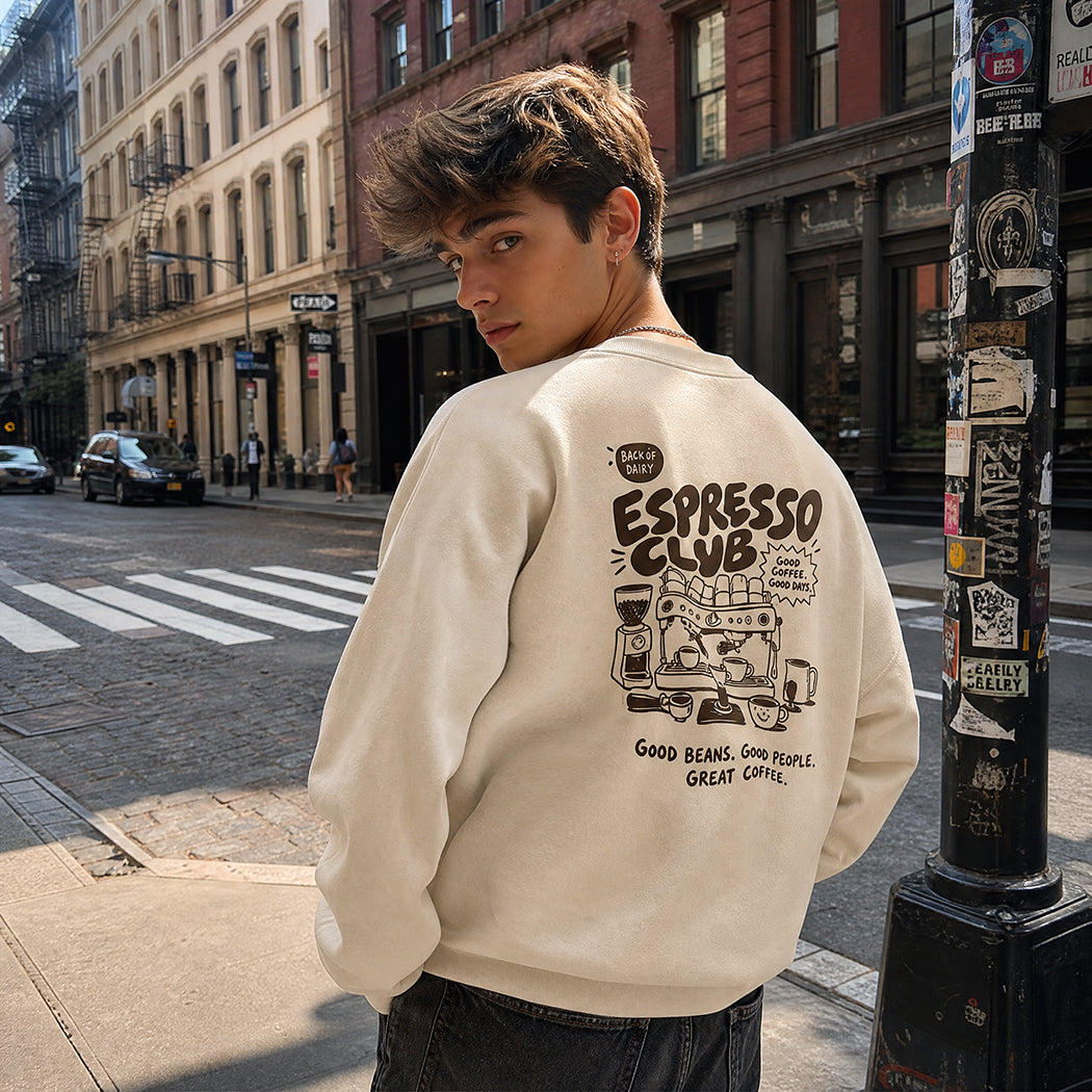 Model wearing Espresso Club graphic sweatshirt in white