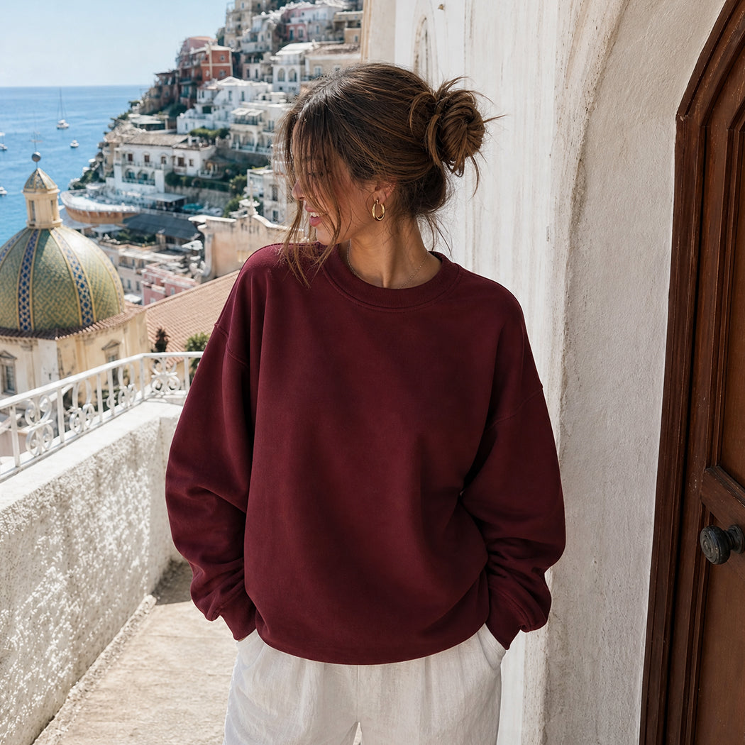 Model wearing Oyster & Champagne graphic sweatshirt, front view