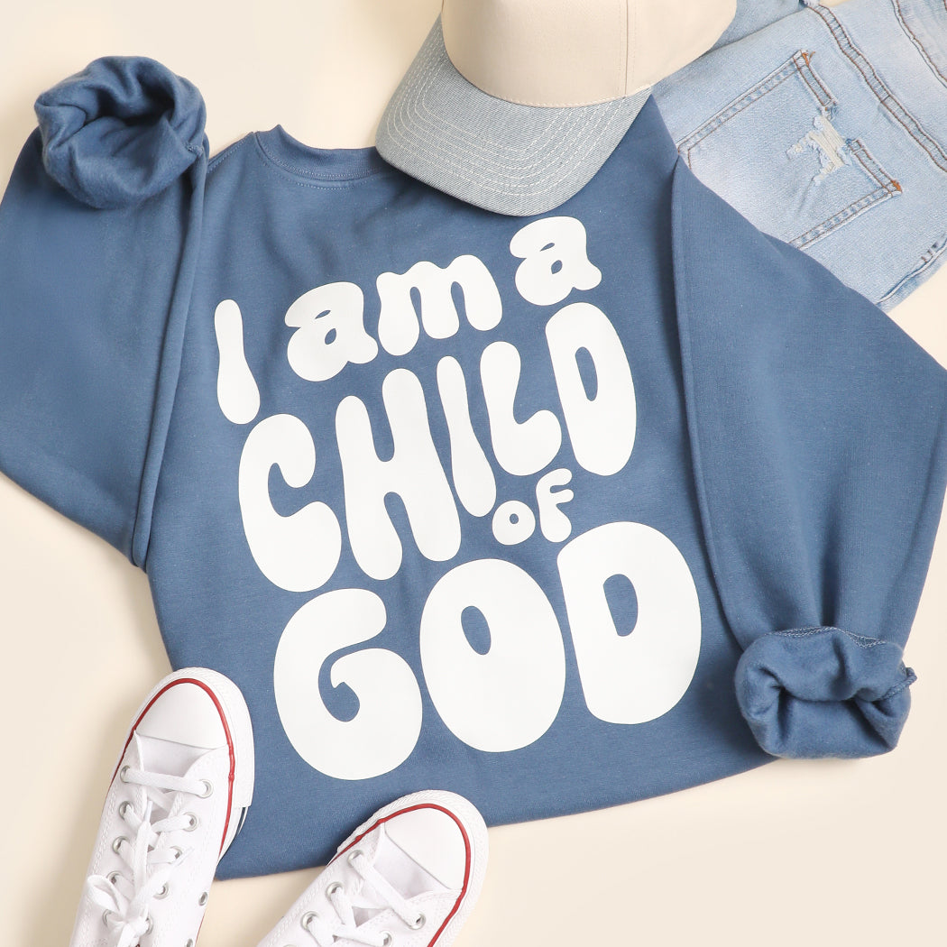 I Am A Child Of God graphic sweatshirt in indigo blue