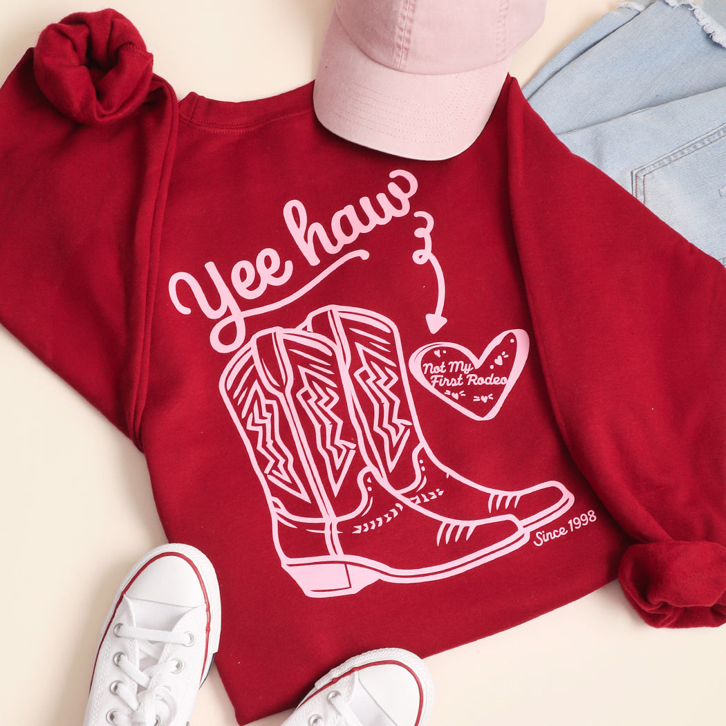 Yeehaw Not My First Rodeo western graphic sweatshirt in garnet