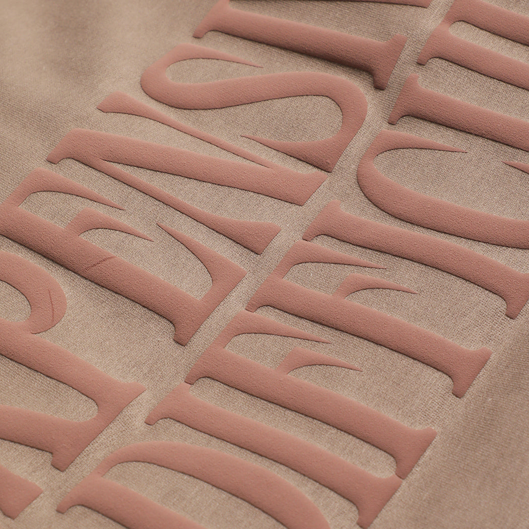 Expensive & Difficult puff sweatshirt in brown savana, back view