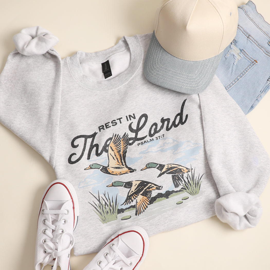 Rest In The Lord flying duck graphic sweatshirt in ash grey