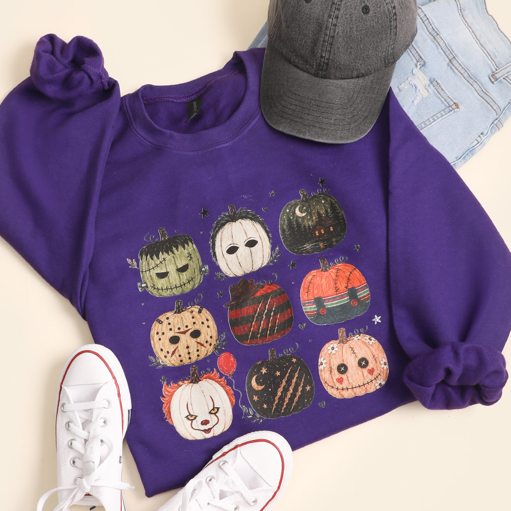 Halloween Horror Pumpkins graphic sweatshirt in purple