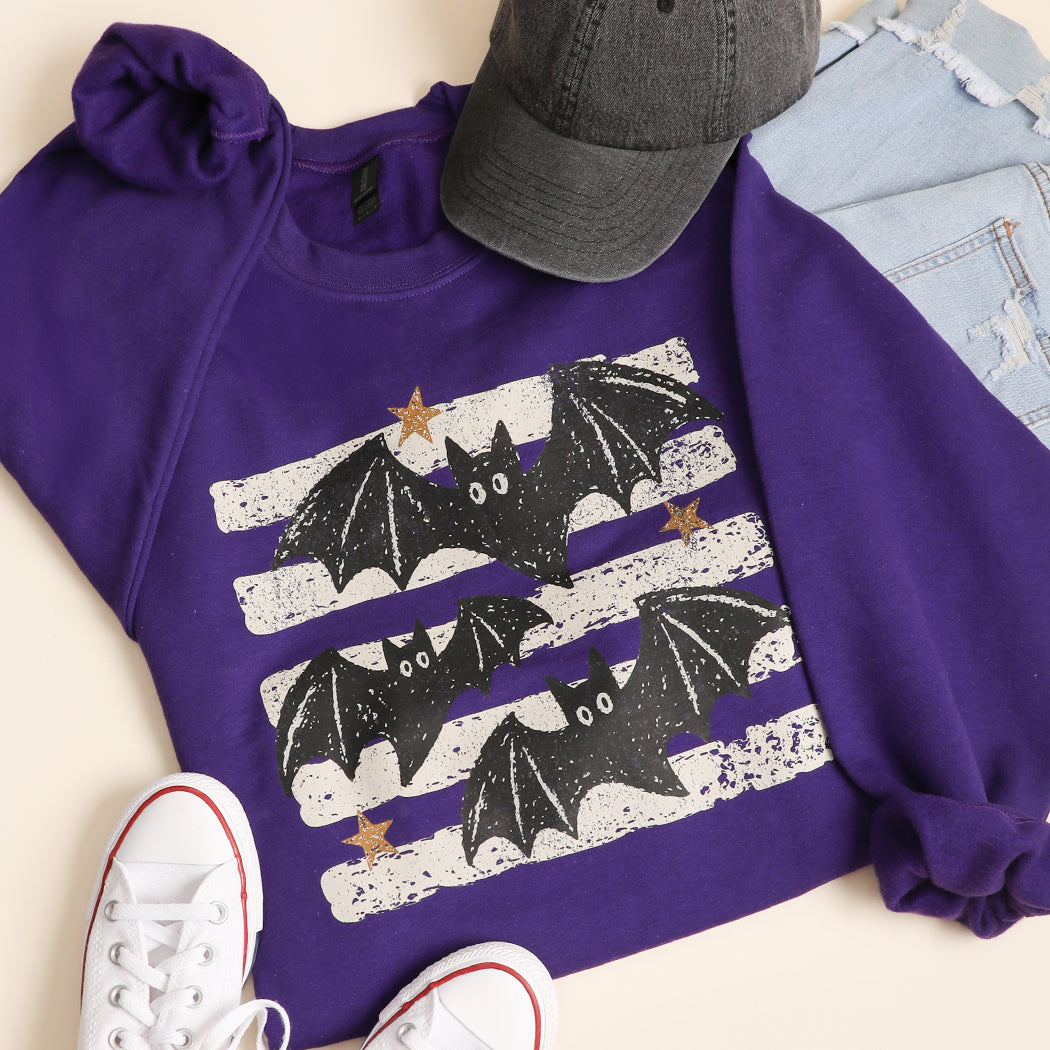 Halloween Bats striped graphic sweatshirt in purple