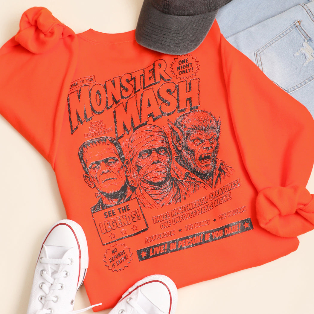 Monster Mash Halloween graphic sweatshirt in orange