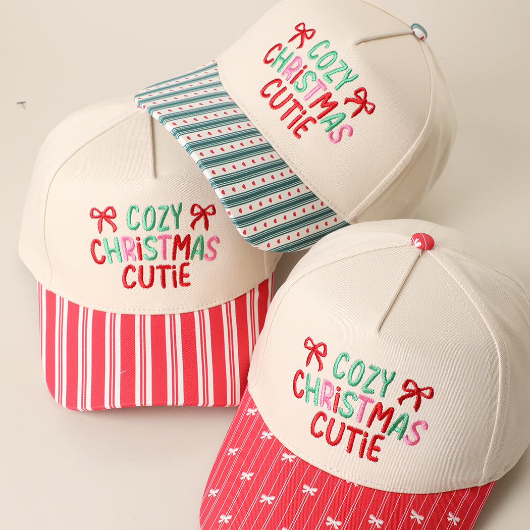 Cozy Christmas Cutie embroidered holiday brim trucker hats in red and green
