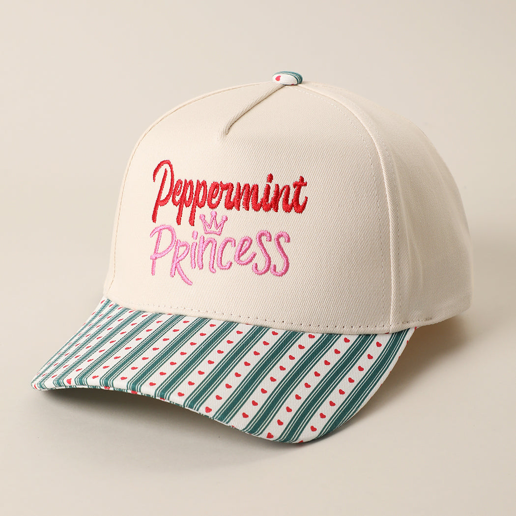 Peppermint Princess holiday brim trucker hat in green, side view