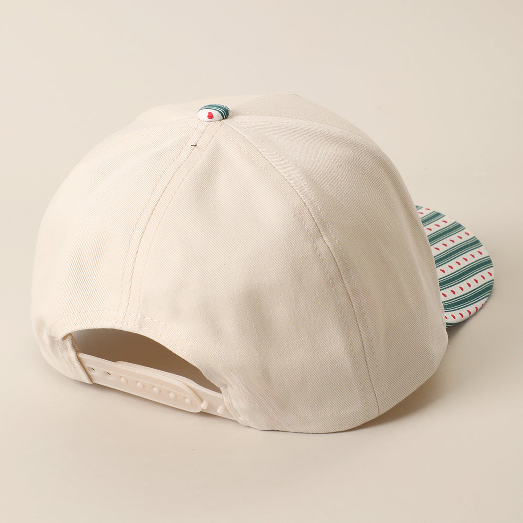Peppermint Princess holiday brim trucker hat in green, back view