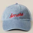 Amore embroidered washed denim baseball cap in light blue