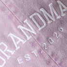 Grandma Est. 2026 embroidered baseball cap in lilac, side view