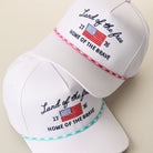 Land of the Free rope trucker hat shown in all color options