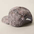 The Dad Club Raising Legends camo trucker hat in dark camo, detail view