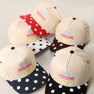 Good Morning Sunshine embroidered polka dot trucker hat, front view
