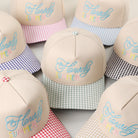 Howdy Summer embroidered gingham brim trucker hat, front view