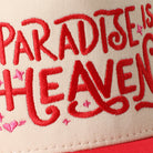Paradise Is Heaven two-tone trucker hat in red, side view