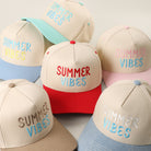Summer Vibes embroidered two-tone trucker hat, front view alternate angle