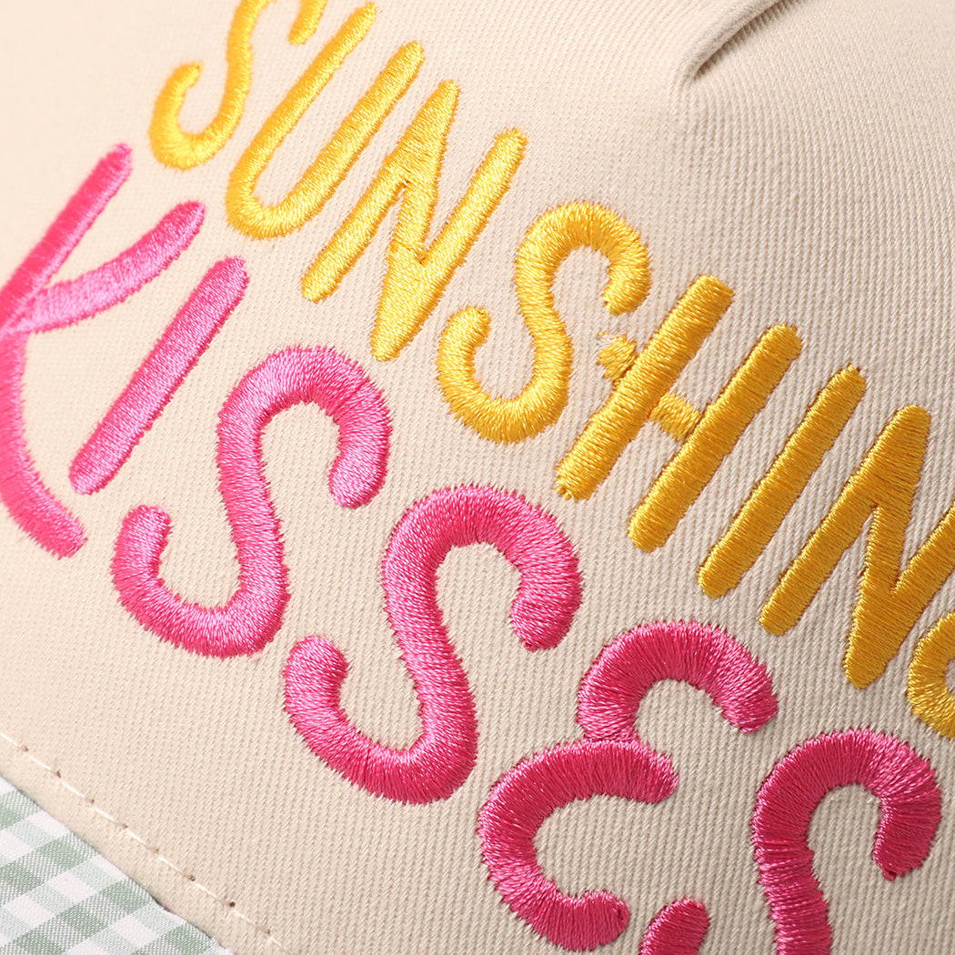 Sunshine Kisses gingham brim trucker hat in green, side view