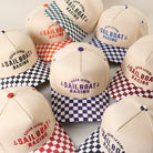 Ocean Legend Sailboat Racing checkered brim trucker hat, all color options