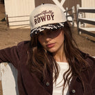Model wearing Respectfully Rowdy printed brim trucker hat