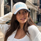 Model wearing JesusGrl embroidered two-tone trucker hat