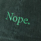 Nope corduroy baseball cap in dark green, side view