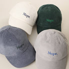 Nope embroidered corduroy baseball cap, side view