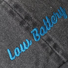 Low Battery embroidered baseball cap in charcoal, side view