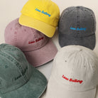 Low Battery embroidered baseball cap shown in all color options