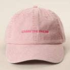 Living the Dream embroidered baseball cap in smoke pink
