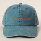 Living the Dream embroidered baseball cap in green