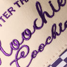 Hotter Than a Hoochie Coochie checkered brim trucker hat in purple, side view